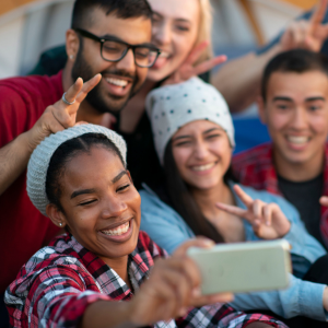 A group of young adults taking a selfie